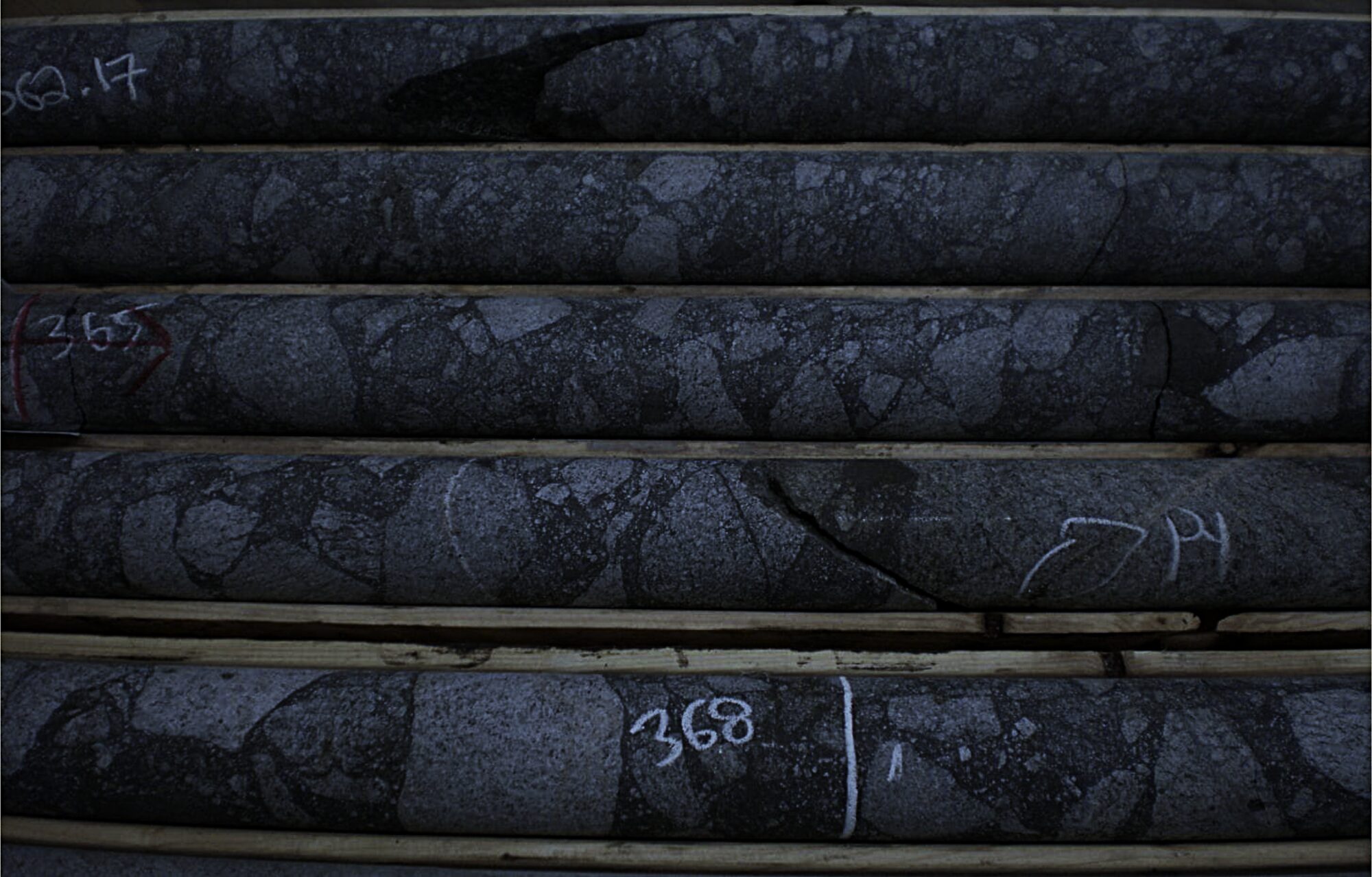 Albany drill core in trays with depth markings